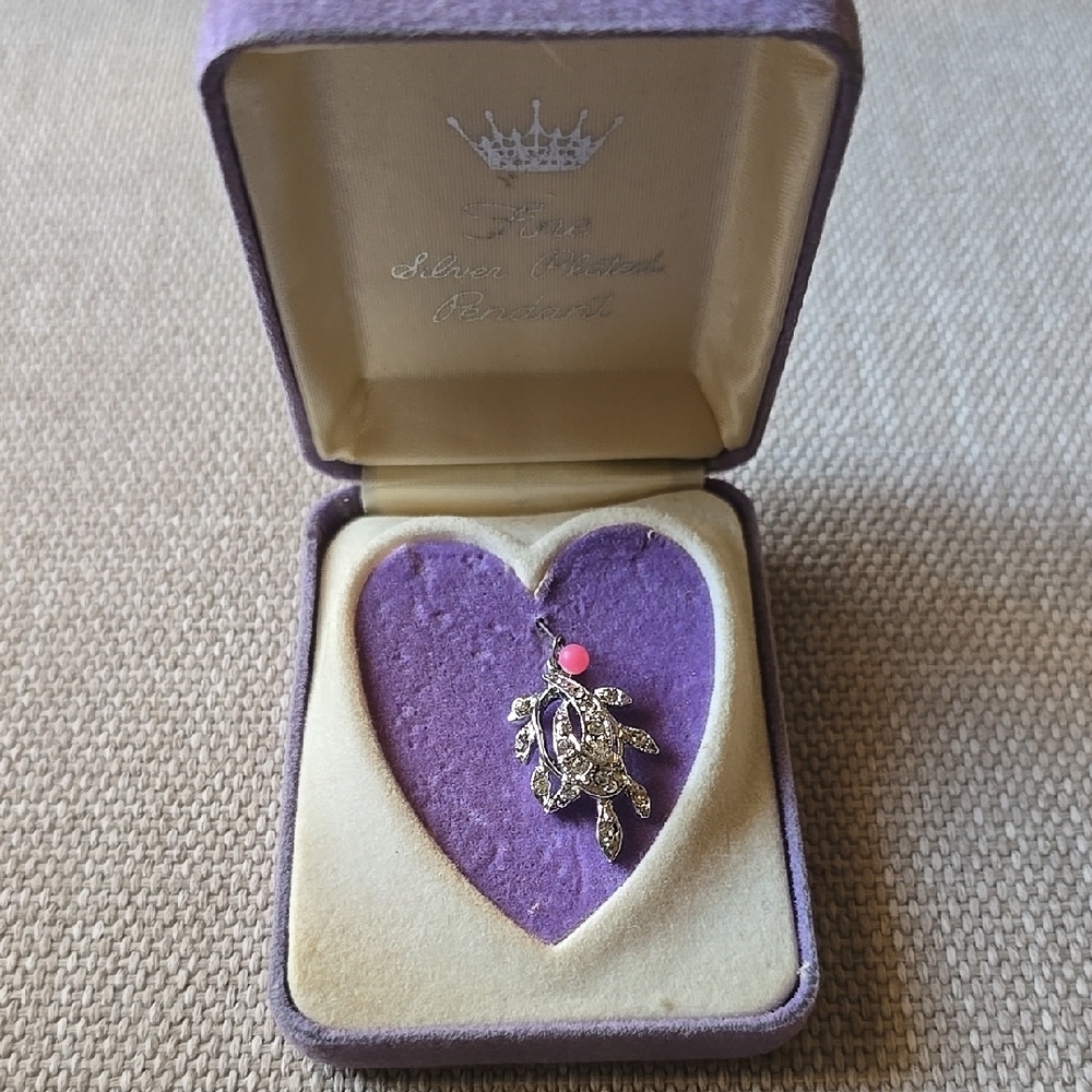 Elegant Silver Pendant with Purple Accents